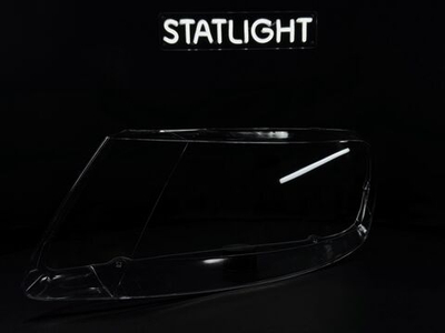 Левое стекло фары Volkswagen Touareg 2002-2007