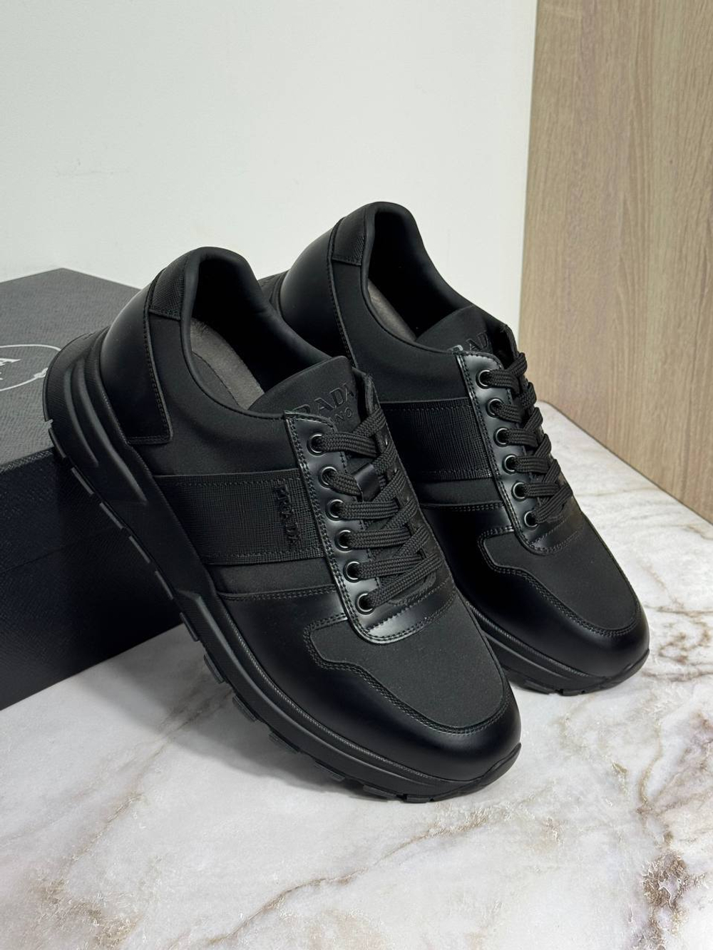 Кроссовки Prada