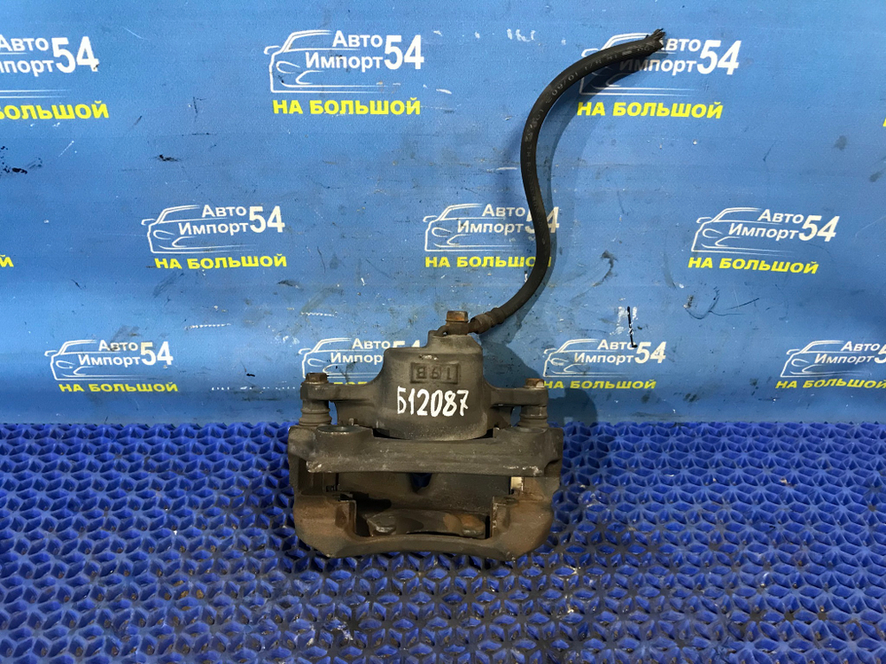 Суппорт тормозной передний левый TOYOTA PROGRES 1998-2007