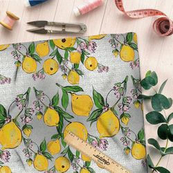 Ткань интерлок лимоны на сером