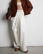 Джинсы молочный