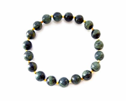 Браслет из крокодиловой яшмы с позолоченными вставками