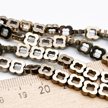 Гематит Клевер бусины (имитация), цвет золотисто-бронзовый, размер около 7 мм, цена за 13 шт (1/4 нити)