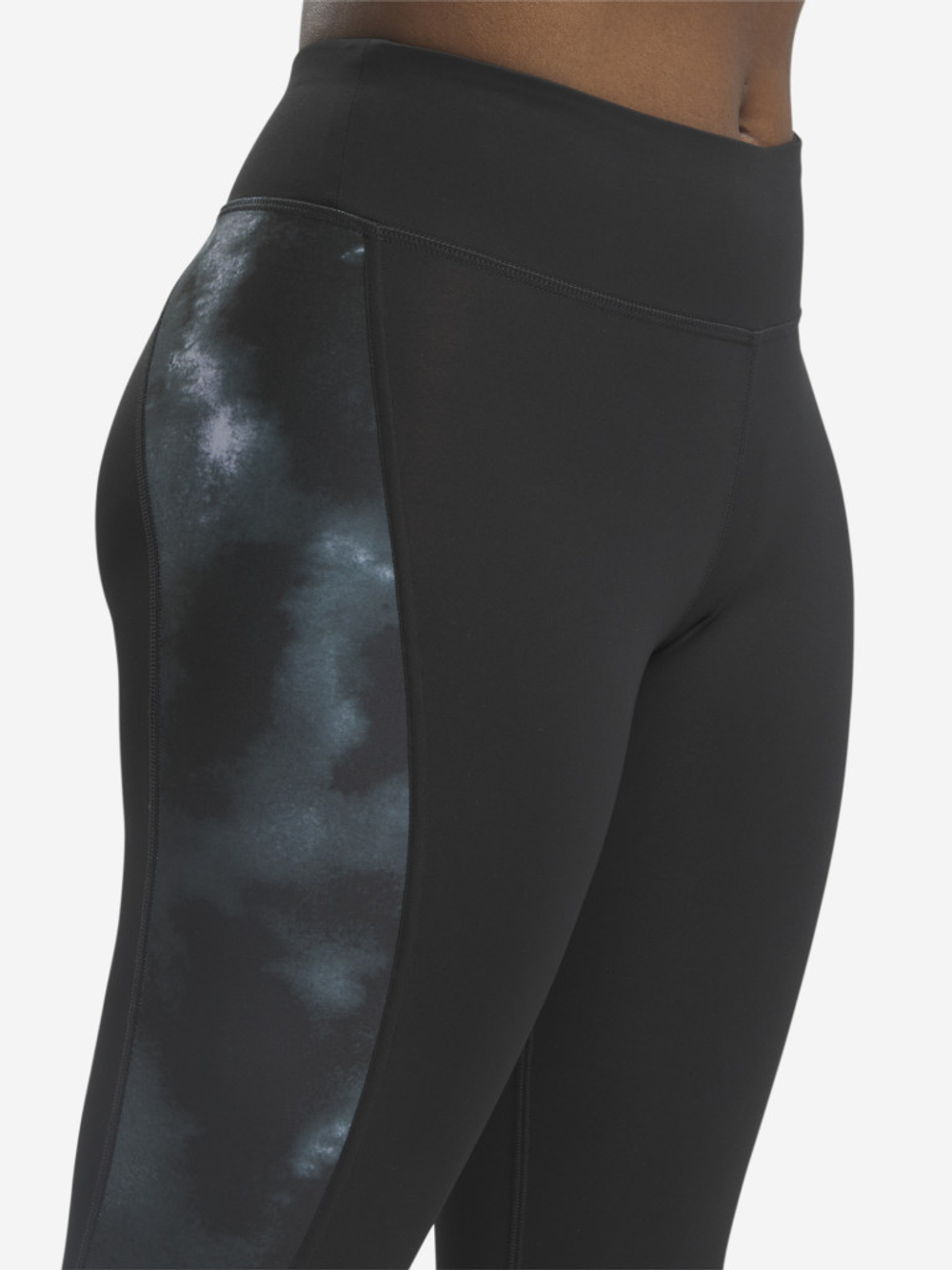 100034899 Тайтсы REEBOK женские