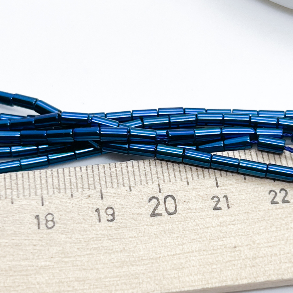 Гематит (имитация), цвет синий, размер около 4,8*2,3 мм, цена за нить 36 см