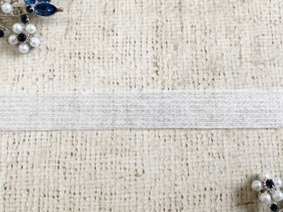 Нитепрошивная кромка клеевая по долевой, ш. 1,5 см.