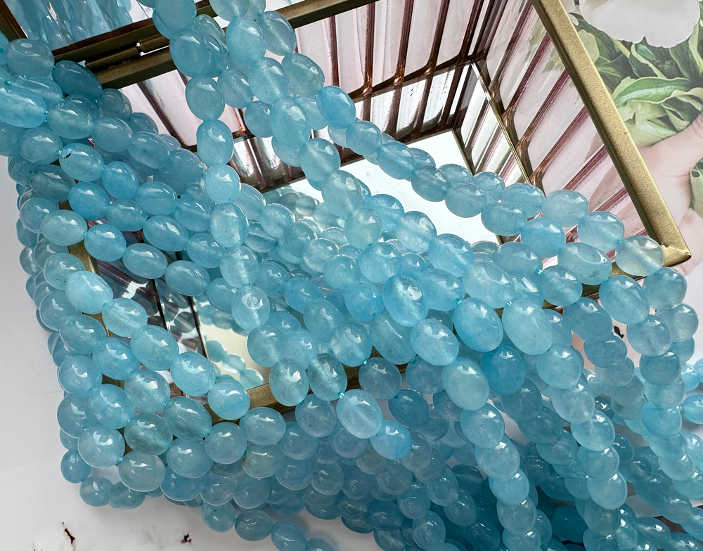 Нить бусин из тонированного кварца 8-9мм (галтовка)