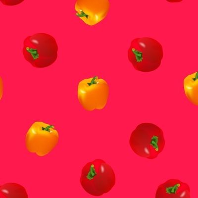 Яркие перцы красный и желтый на розовом фоне