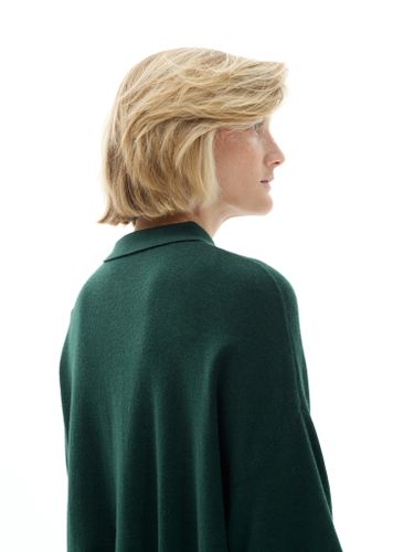 Зеленая трикотажная футболка-поло