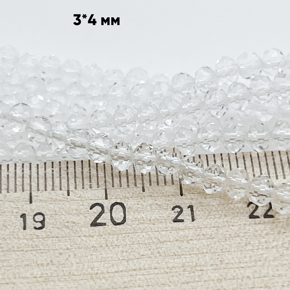 Бусина стекло, цвет прозрачный, размер 3*4 мм, цена за 3 грамма (около 40 шт)