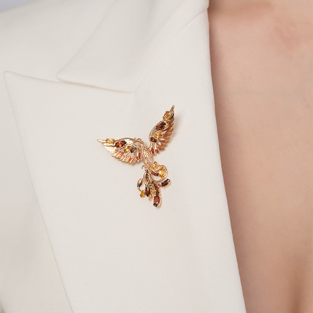 Брошь «Феникс» из красного золота с гранатами, цитринами и эмалью
