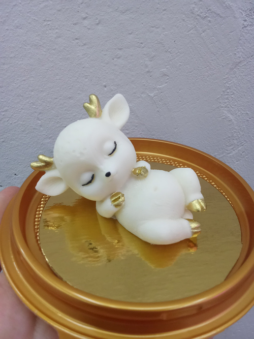 Олененок лежа из шоколадной глазури