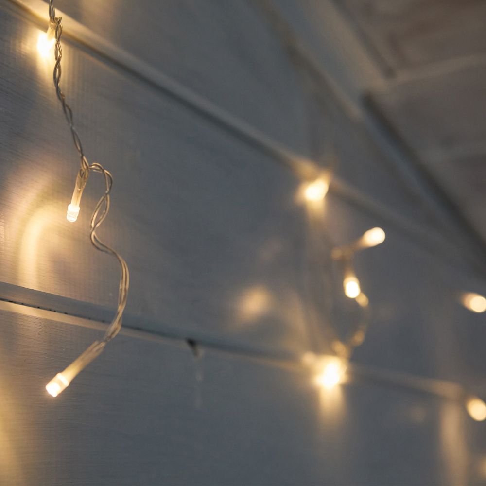 ULD-B12006-195-TTK WARM WHITE IP44 Бахрома светодиодная с эффектом мерцания. 12м. Соединяемая. 195 светодиодов. Теплый белый свет. Провод прозрачный. ТМ Uniel