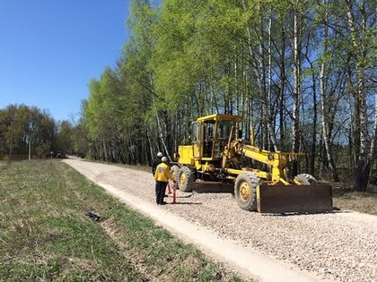 Строительная техника предоставлена для ремонта подъездной дороги