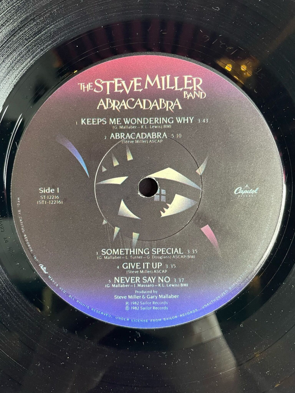 Винтажная виниловая пластинка LP The Steve Miller Band Abracadabra (USA 1982). Abracadabra