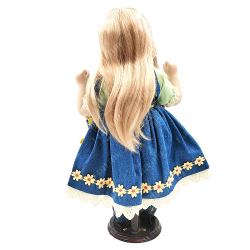 Фарфоровая кукла Remeco в летнем платье с игрушками в карманах. Великобритания, 2001 г.