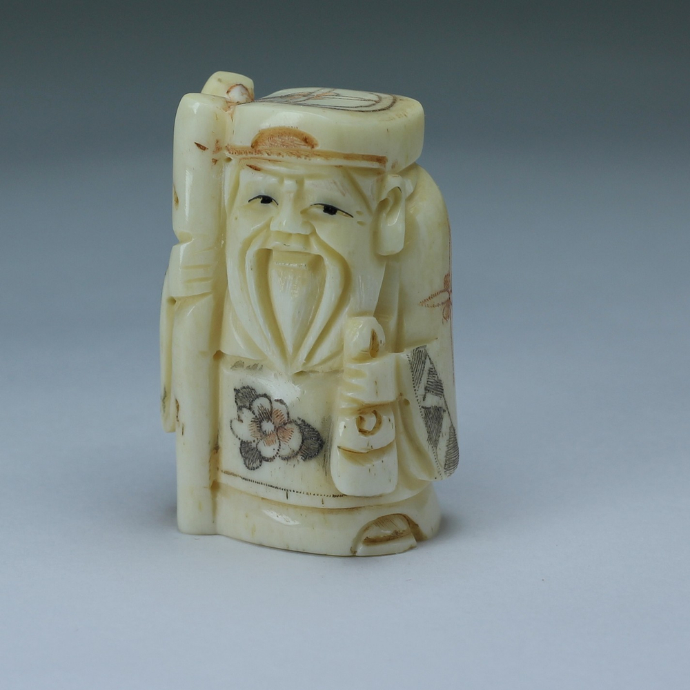 Нэцкэ Дзюродзин с посохом и кисетом