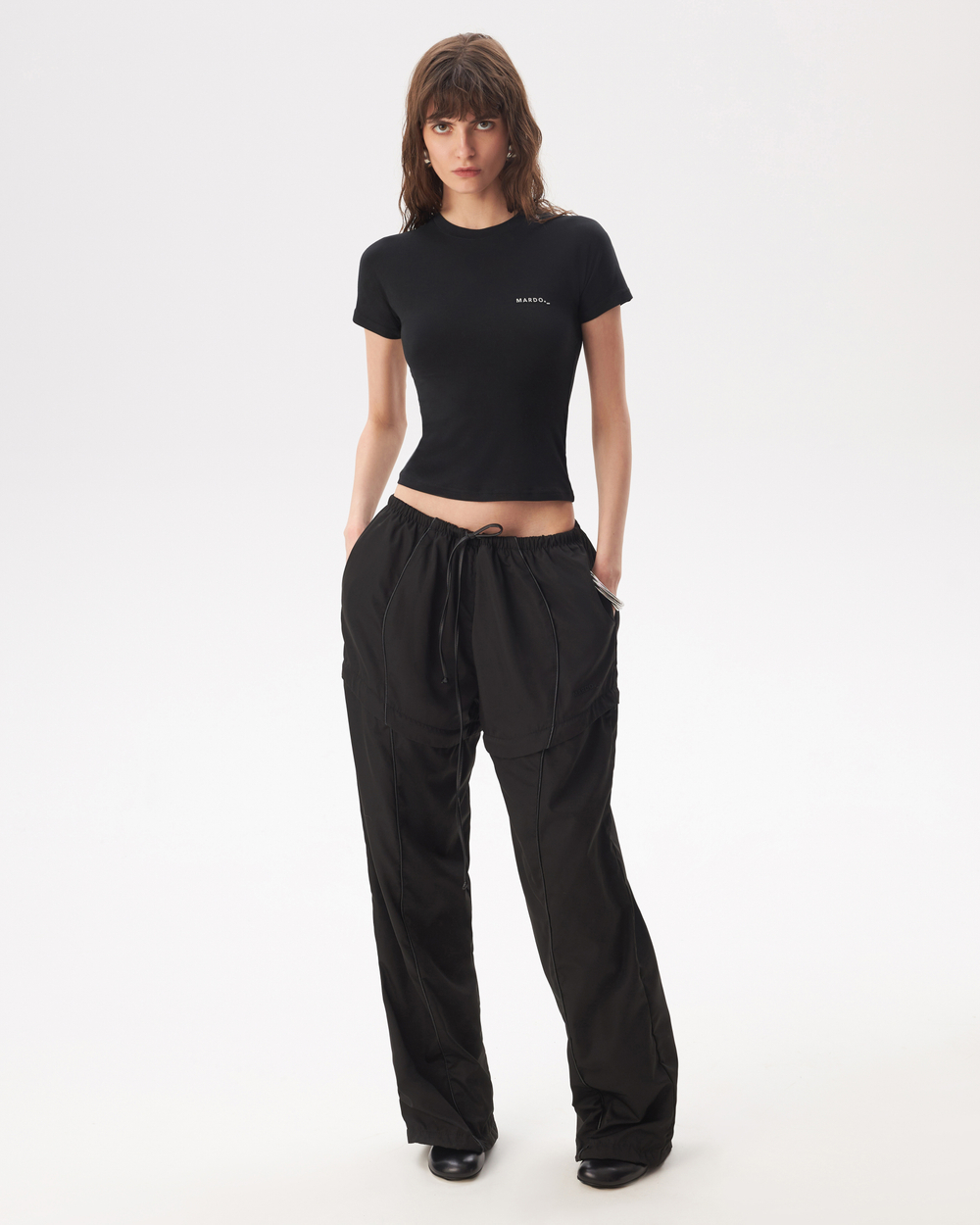 BLACK TRANSFORMING TRACKPANTS