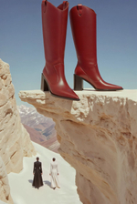 Женские удлинённые казаки из кожи