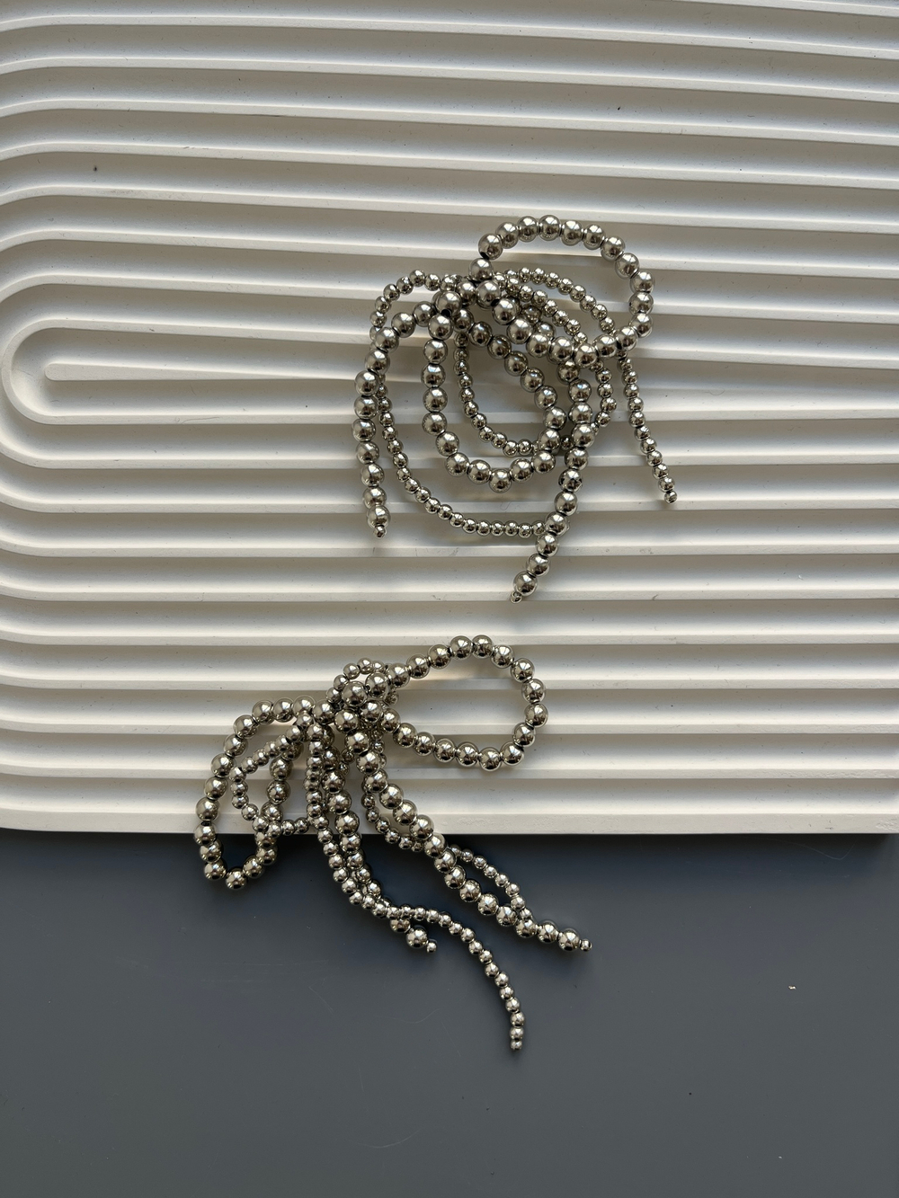 Серьги BOW