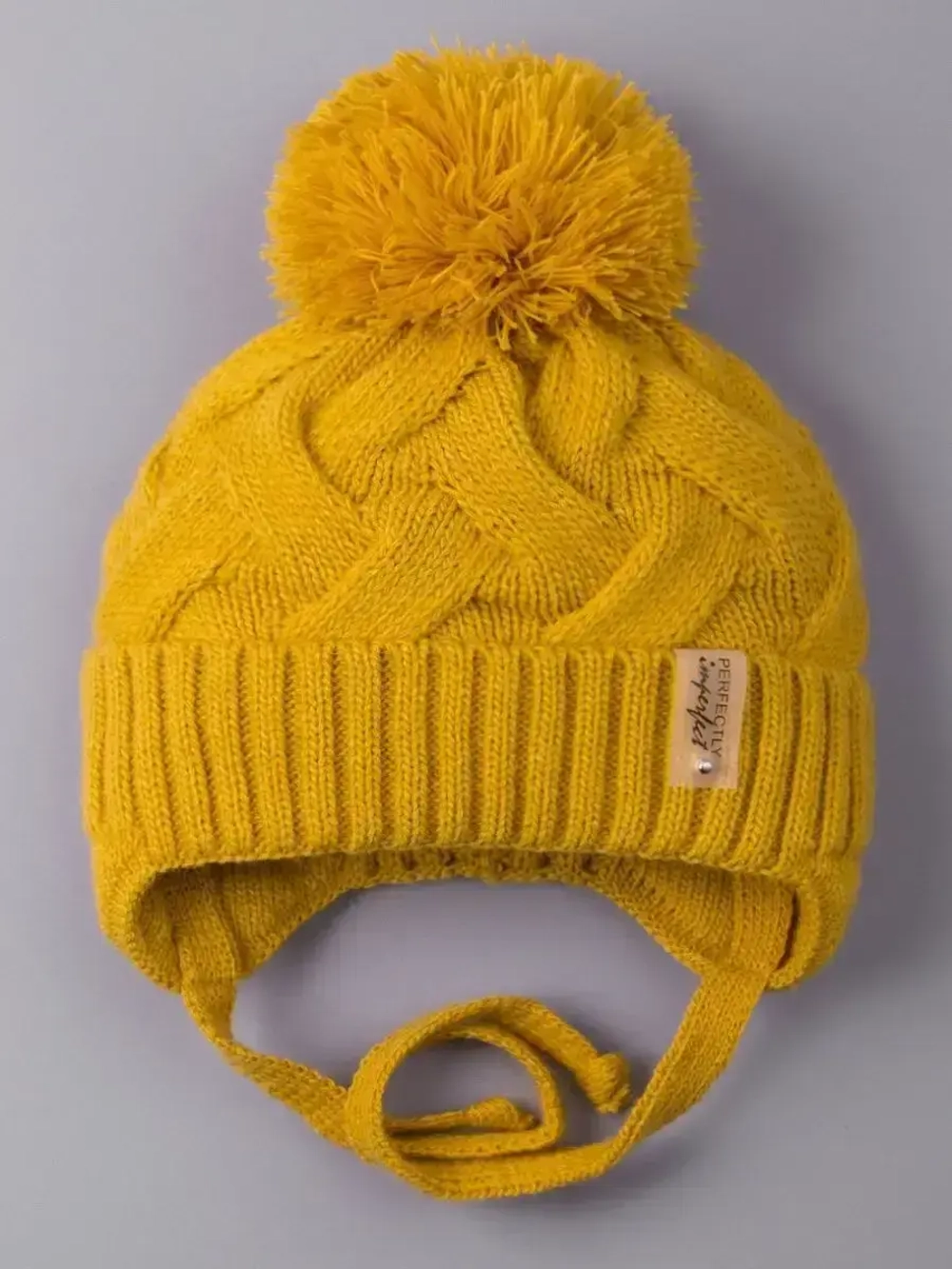 Шапка вязаная демисезонная на завязках для детей