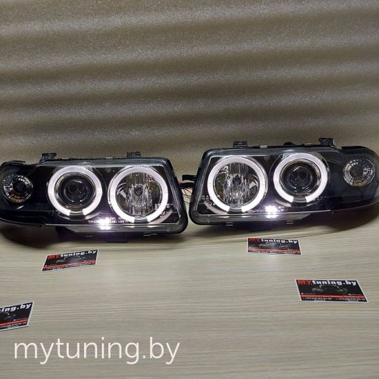Передние фары Opel Astra F angel eyes black