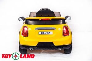 Детский электромобиль Toyland Mini Cooper желтый