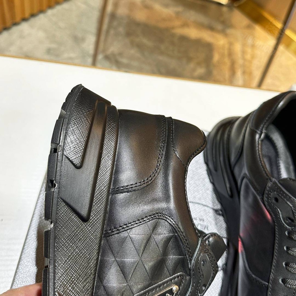 Кроссовки Prada
