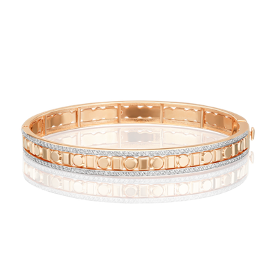 Браслет жесткий из комбинированного золота с фианитами