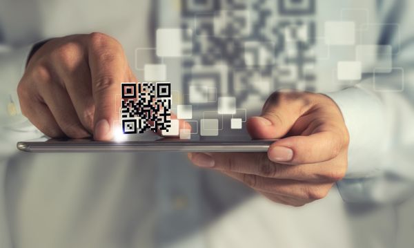 Сбербанк создает свою систему по оплате товаров через QR-код