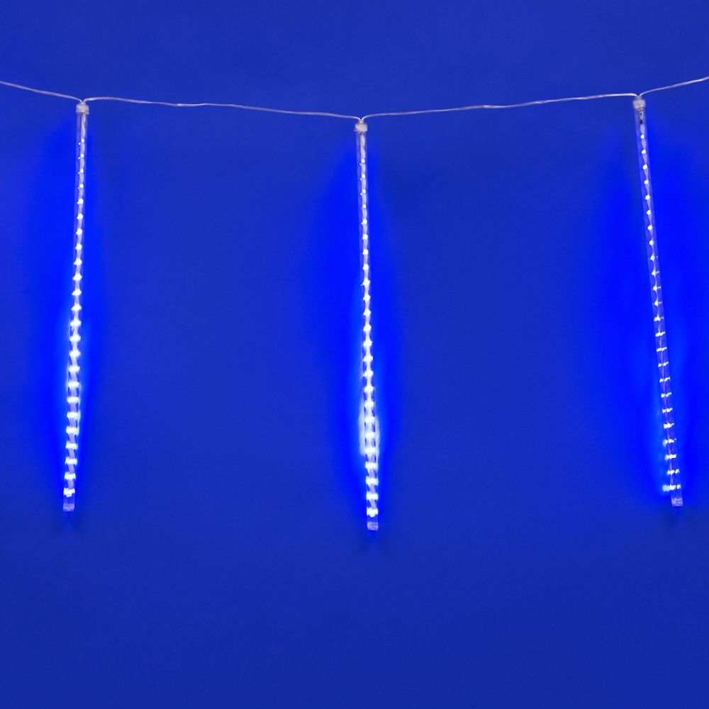 ULD-E1505-336-DTK BLUE IP44 TWISTED METEOR Занавес светодиодный фигурный Звездный дождь. соединяемый. 6 подвесов. 336 светодиодов. Размер 1.5х0.5м. Цвет свечения синий. IP44. Провод прозрачный. Упаковка картон.