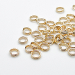 Колечки двойные, цвет золото, диаметр 5 мм, цена за 2 грамма (около 20 штук)