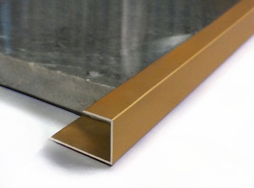 Алюминиевый С-образный окантовочный профиль золото LU