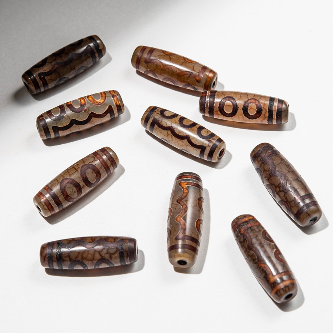 Бусина Дзи "Пять глаз" из агата, 29,5*10мм, коричневый