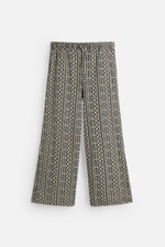 Жаккардовые брюки relaxed fit с перфорацией