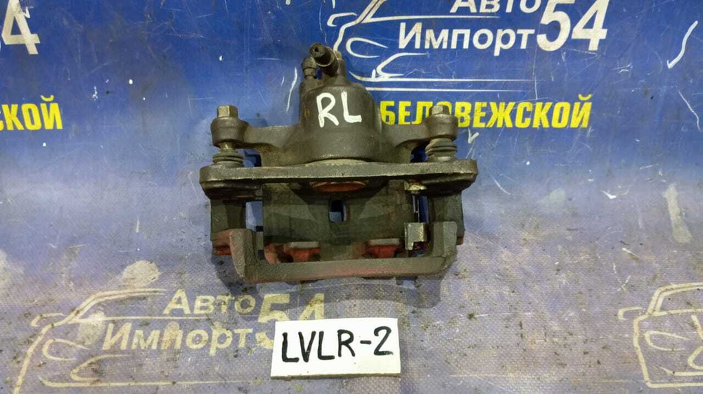 Суппорт тормозной задний левый MAZDA MPV 1996