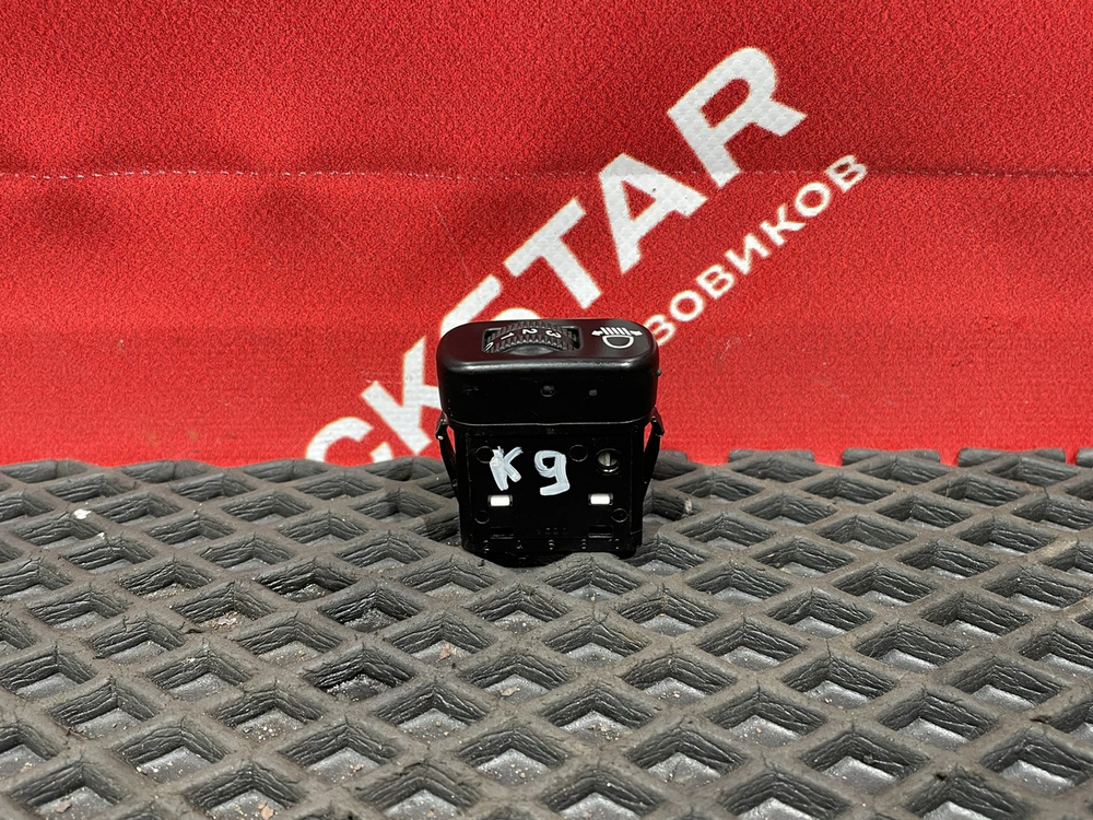 Кнопка корректора фар