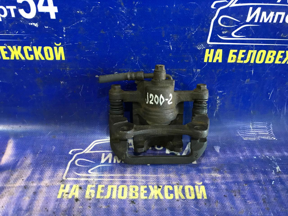 Суппорт тормозной задний левый CHEVROLET LACETTI 2006