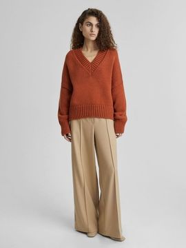 AIM  крупной вязки с V-образным вырезом. Цвет Терракот. 50% шерсть мериноса.