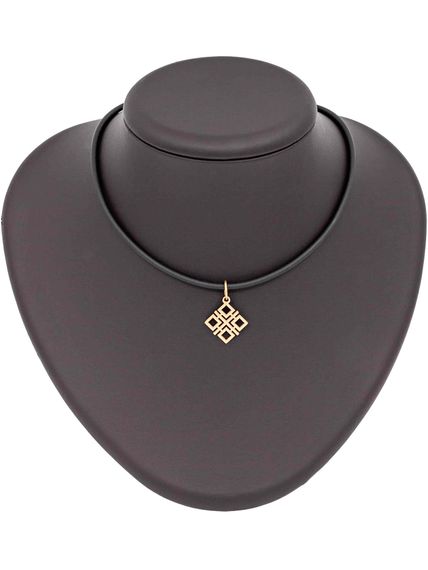 Фото подвеска Макошь малая из серебра 925 пробы с позолотой, вид на постаменте.