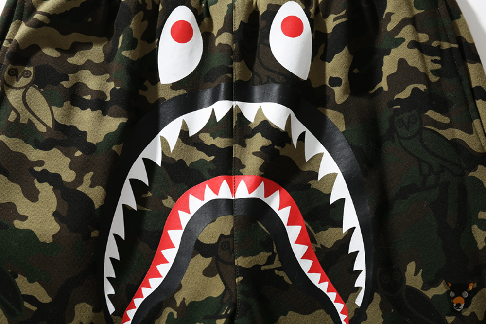 Двусторонние штаны Bape x OVO