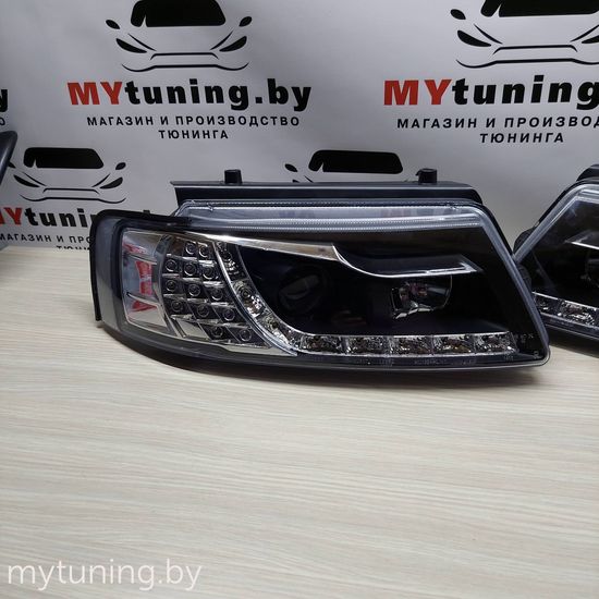 Передние фары VW Passat B5 daylight black