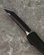 Автоматический складной нож Microtech Ultratech T/E Black Tanto 123-2T (черный-полусеррейтер) фронталка/выкидуха