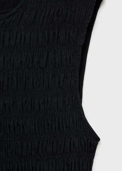 Расклешенное платье с жатым лифом