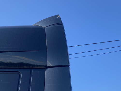 Спойлер (следы ремонта) кабины верхний левый 2019г