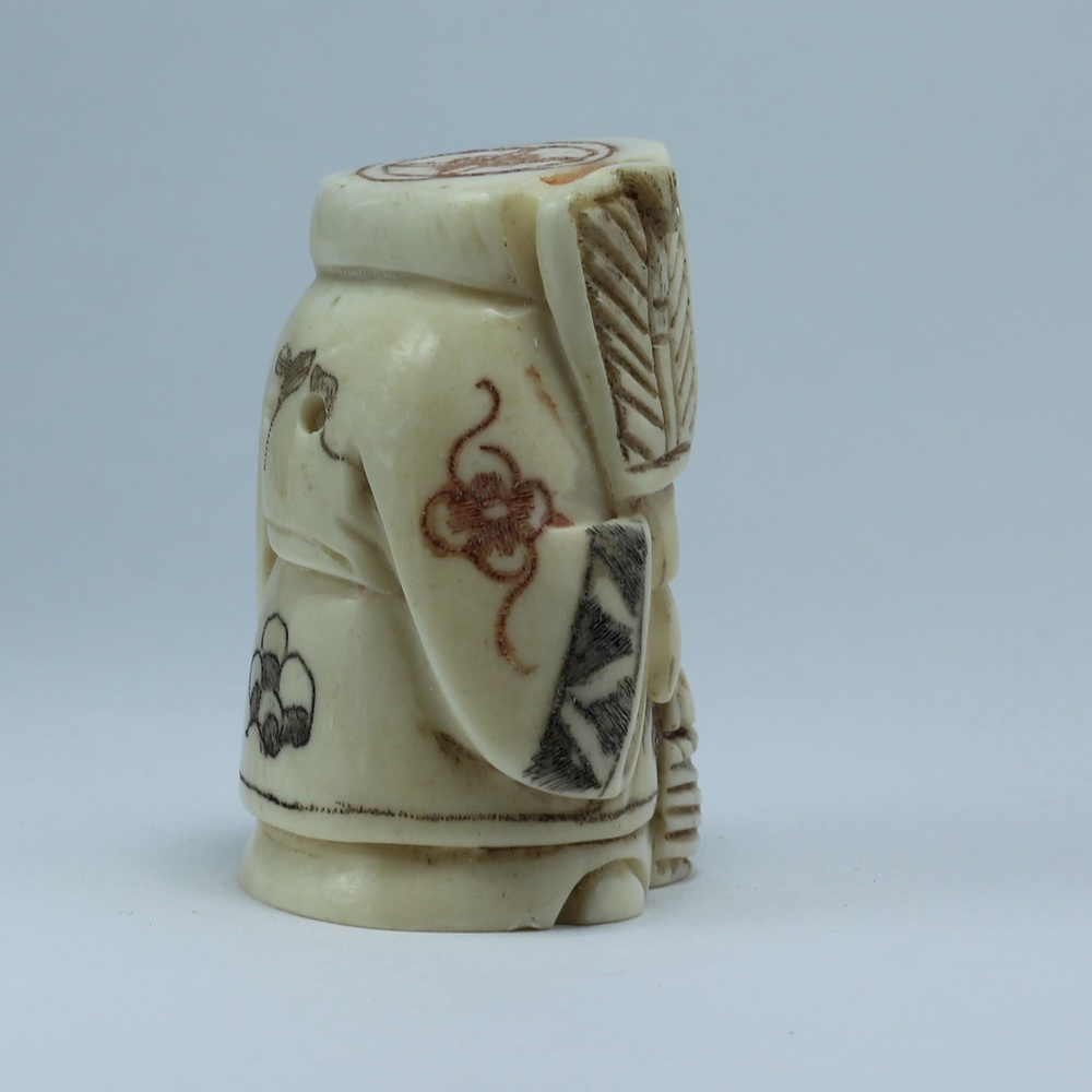 Нэцкэ Дзюродзин с веером и корзиной рыбы