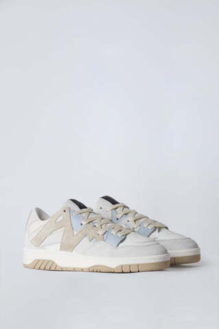 Кроссовки из натуральной кожи