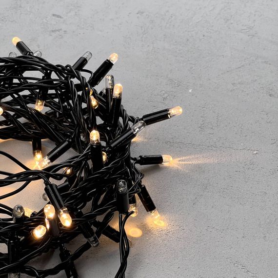 Светодиодная гирлянда с колпачком 100 теплых белых LED ламп 10 м., мерцание каждого диода, 24В., черный провод ПВХ, IP65, LTC (PST100ABLCAP-11-1WW)