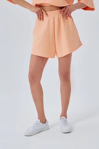 Шорты укороченные из рифленого хлопка персикового цвета