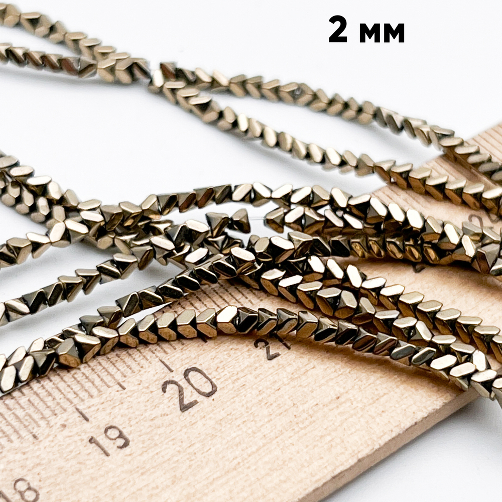 Гематит Стрелка бусины (имитация), цвет золотистый, размер около 2 мм, цена за отрезок 19 см (1/2 нити)